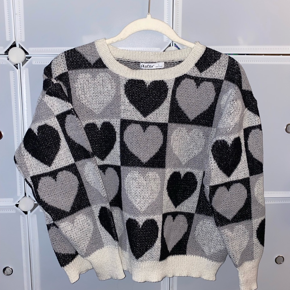Long sleeve crocheted sweater with heart patterns